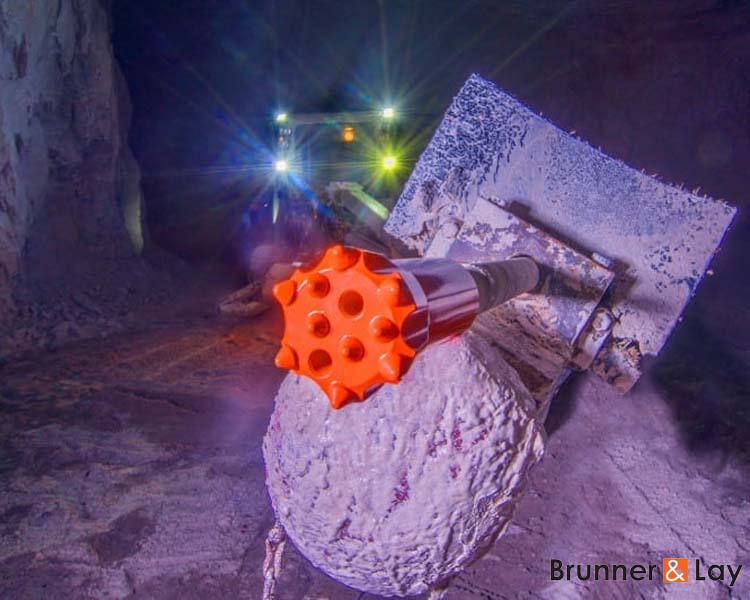 Construction worker using Brunner and Lay demolition hammer to dismantle concrete slab during major demolition project - Certified Brunner and Lay tools supplier