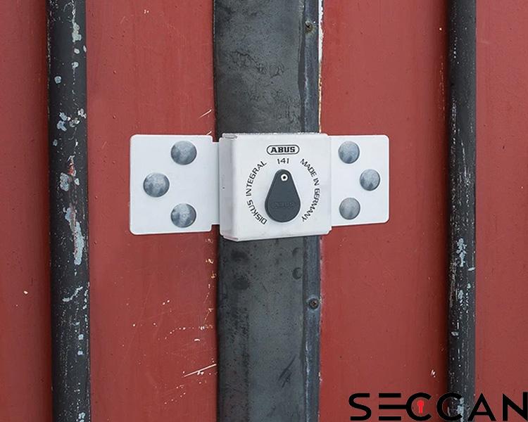 ABUS Diskus container lock securing a red shipping container, featuring Seccan branding.